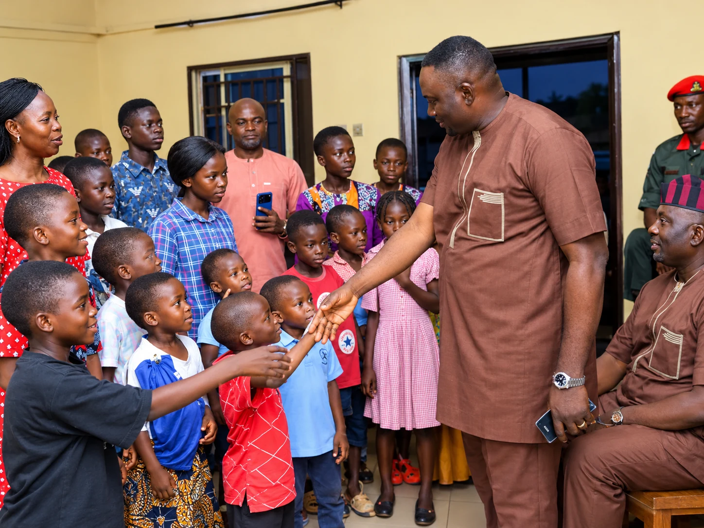 Chief Ojema during a community outreach visit marking three years in office